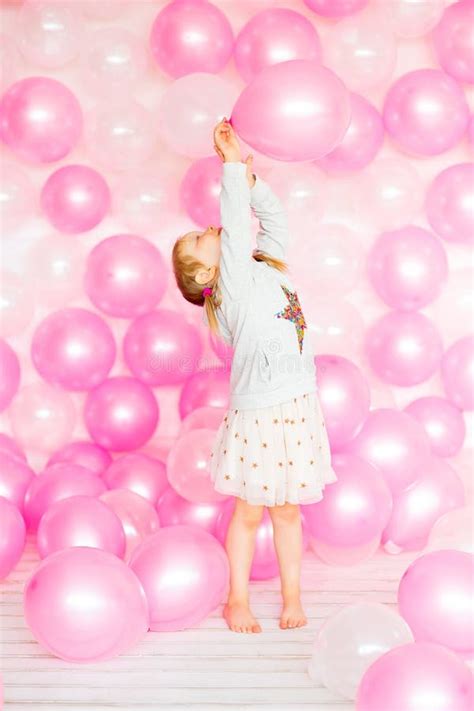 Little Girl Playing with Pink Balloons Stock Image - Image of inside ...