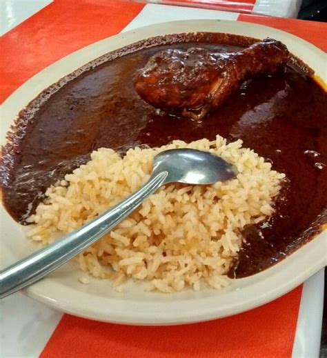 Arroz con pollo y mole. Rice, chicken leg and mole - fantastic dish ...