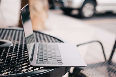 Working on a Laptop Outside on Sunny Evening Free Stock Photo | picjumbo