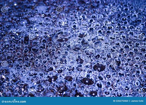 Millions of Bubbles from the Boiling Water in a Pan Stock Photo - Image ...