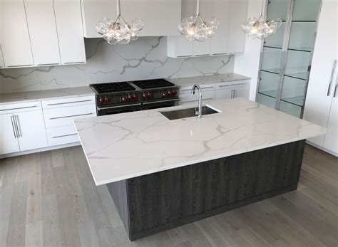 ColorQuartz Calacatta Novus Kitchen island and bar area with full ...