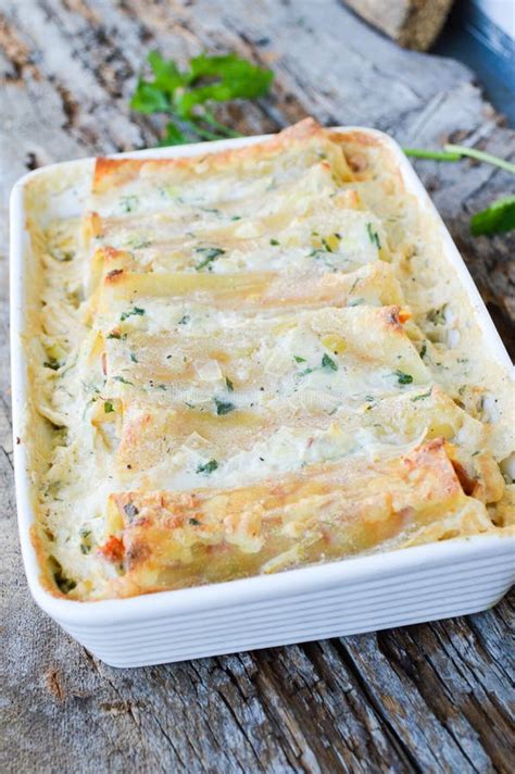 Pasta Cannelloni Stuffed with Meat, White Bechamel Sauce, Cheese Stock ...