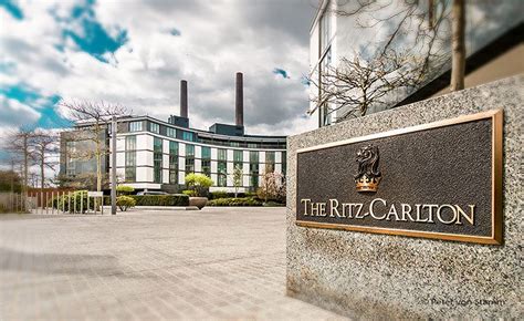 the entrance to the ritz carlton building