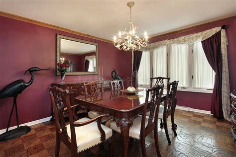 Dining Room with Maroon Walls Stock Photo - Image of architecture ...