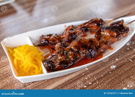 Popular Filipino Food Pork Barbeque with Papaya Atchara Stock Image ...