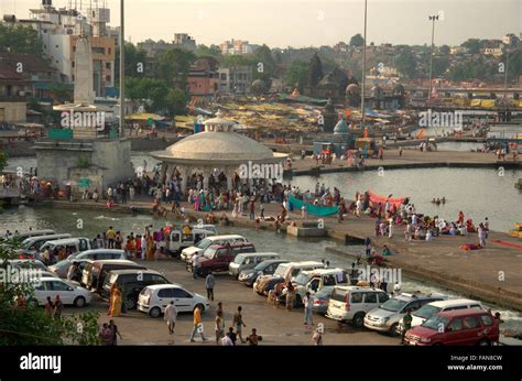 Parked vehicles at Panchvati, a ghat at Godavari river bank, Nashik ...