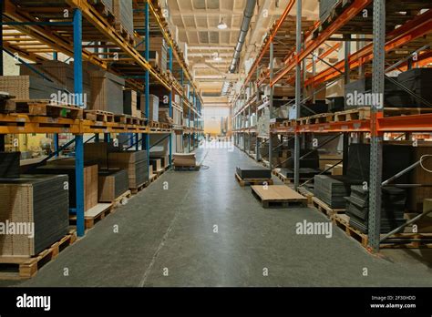 Huge warehouse interior on factory Stock Photo - Alamy