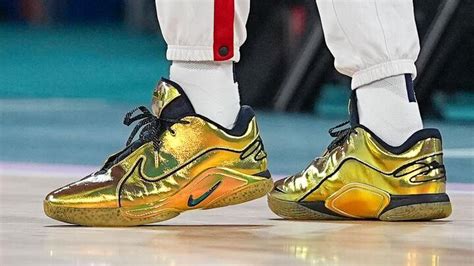 LeBron James gold shoes: USA star debuts flashy sneakers in Olympic ...