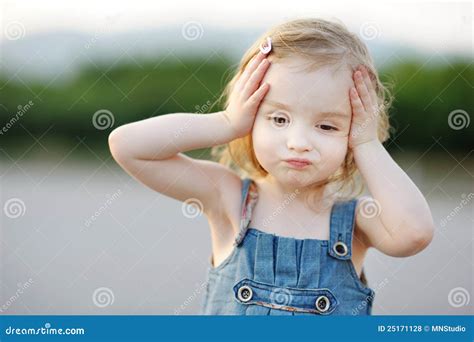 Adorable Little Girl Making Funny Face Royalty Free Stock Photos ...