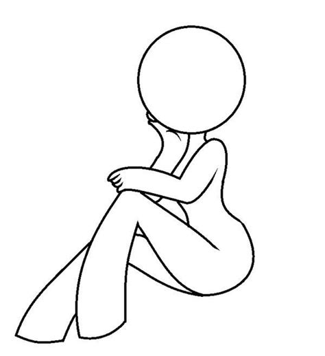 a person sitting on the ground with their legs crossed and arms folded ...