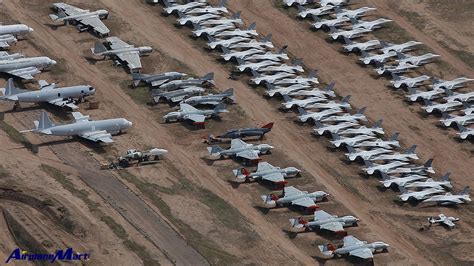 an aerial view of many planes parked on the ground