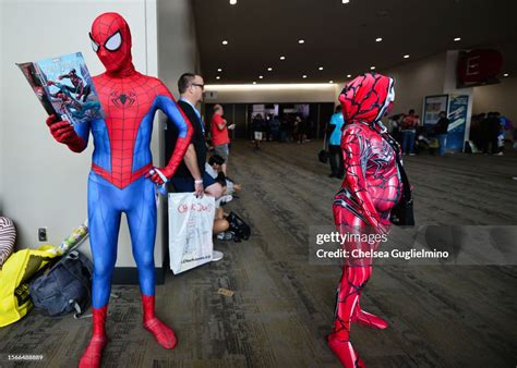 Cosplayers dressed as Spider-Man are seen during 2023 Comic-Con... News ...