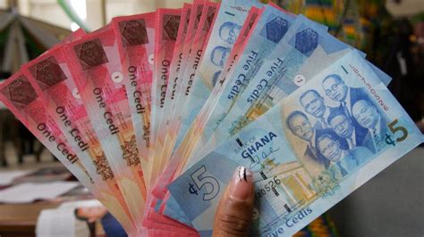 Ghana limits dollar transactions to protect cedi - BBC News