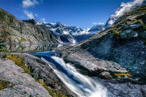 Mountains and River landscape in Fiordland National Park, New Zealand ...