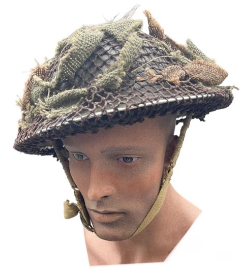 IMCS Militaria | British WW2 Brodie Helmet with camo net with scrim