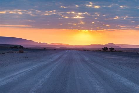 Premium Photo | Sunrise over the namib desert, roadtrip in the ...