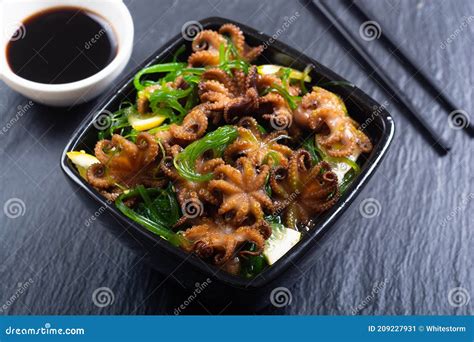 Baby Octopus Fried with Lemon Stock Image - Image of seafood, octopus ...