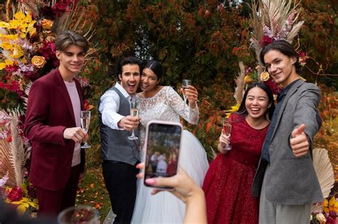 Premium Photo | Front view smiley people at wedding