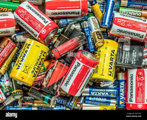 Pile of different used and corroded alkaline batteries Stock Photo - Alamy