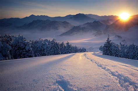 Premium Photo | Snowcovered road in mountain