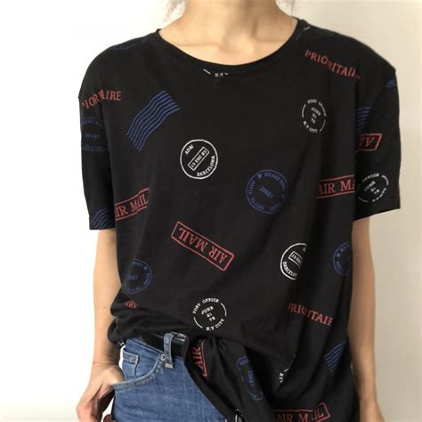 Black pull and bear T-shirt. With travel stamp print... - Depop