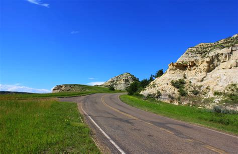 Roadway in the park at Theodore Roosevelt National Park, North Dakota ...