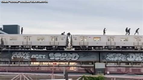 Subway surfers caught on video walking atop Brooklyn J train headed ...