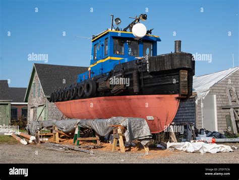 Old Tugboat Under Repair A well-preserved tugboat awaits further ...