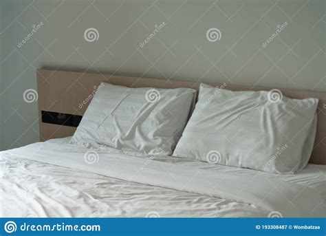 Pillows on the Modern Bed in the Bedroom at the Hotel Stock Image ...