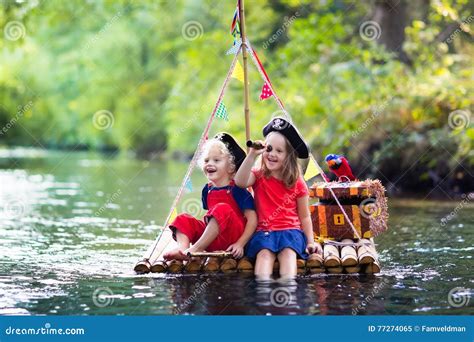 Kids Playing Pirate Adventure On Wooden Raft Royalty-Free Stock ...