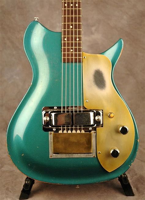 Rickenbacker - Very cool color and design. Love the horseshoe style ...