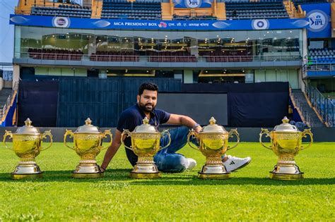 Rohit Sharma poses with the five IPL trophies he has won as Mumbai ...