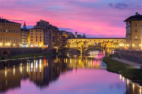 Premium Photo | River arno and famous bridge ponte vecchio at gorgeous ...