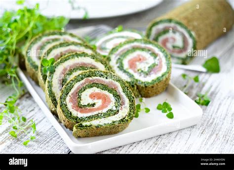 Smoked salmon, spinach and cream cheese roulade. French cuisine ...