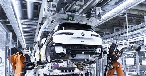 Integrating robotics and electric powertrains in BMW production ...