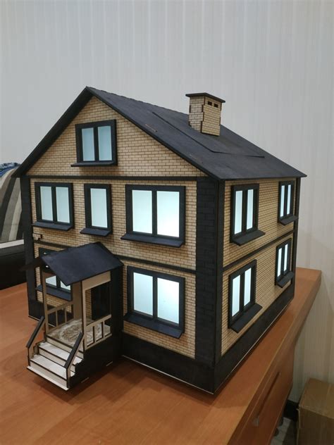 Laser Cut Wooden House Model Free Vector