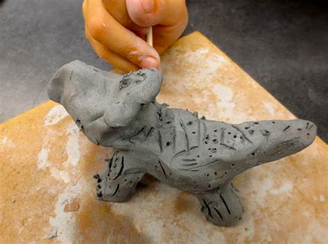 Zilker Elementary Art Class: 1st Grade Clay Dinosaur Sculptures