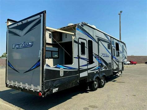 2016 KEYSTONE FUZION 345 FIFTH WHEEL TOY HAULER TRAILER RV 3 SLIDES ...