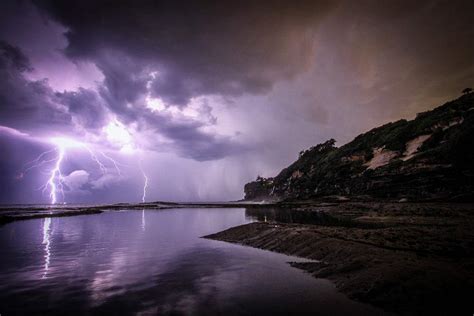 Purple lightning streaks at sea | Free Photo - rawpixel