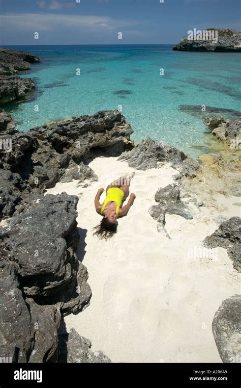 Woman in sand patch on uninhabited island Elbow Cay Cay Sal Bank ...