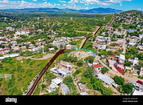 Aerial view of the border wall in Nogales Sonora (R) in Mexico and ...