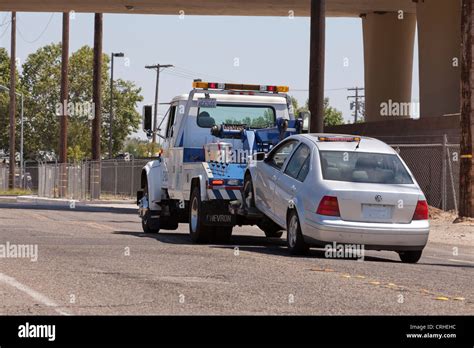 A car being towed - California USA Stock Photo - Alamy