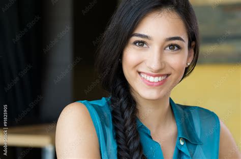 Beautiful young woman smiling Stock Photo | Adobe Stock