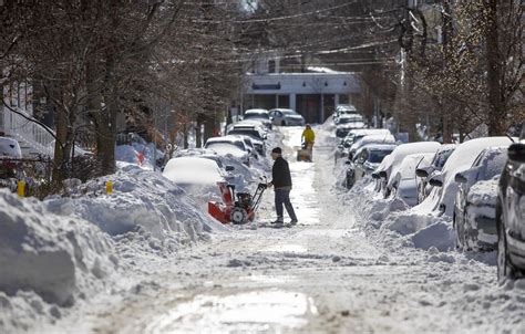 Photos: Mass. residents dig out after blizzard conditions, heavy ...