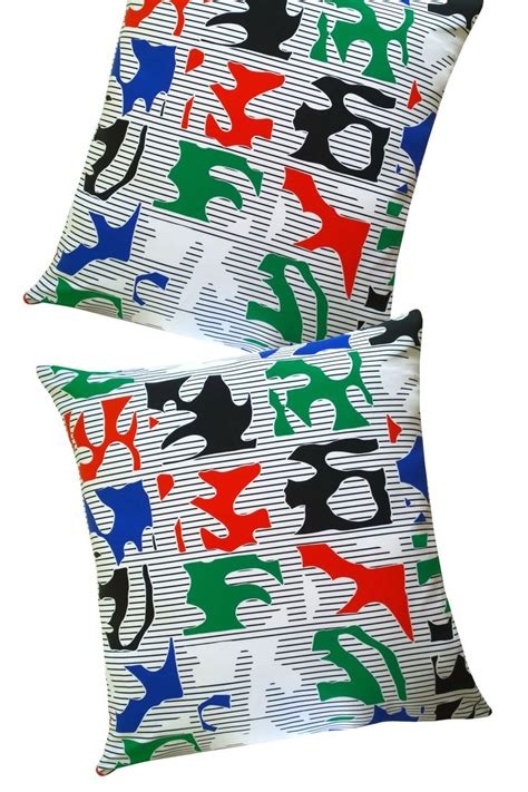 Colorful pillows - green, red, blue abstract pattern on black & white ...