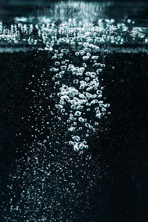 Macro Photography of Bubbles in Water · Free Stock Photo