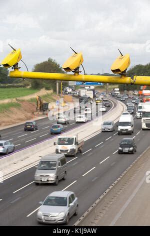 Average speed cameras on the M6 motorway in Cheshire,UK Stock Photo - Alamy