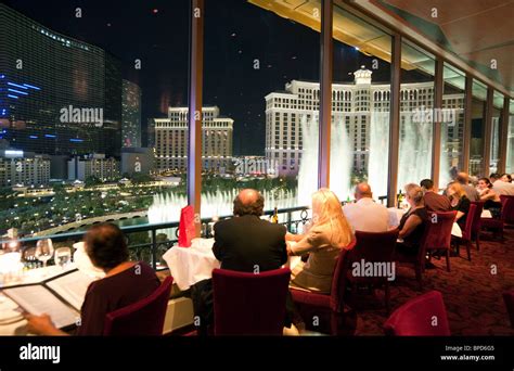 Diners in the The Eiffel Tower restaurant, The Paris Hotel, looking out ...