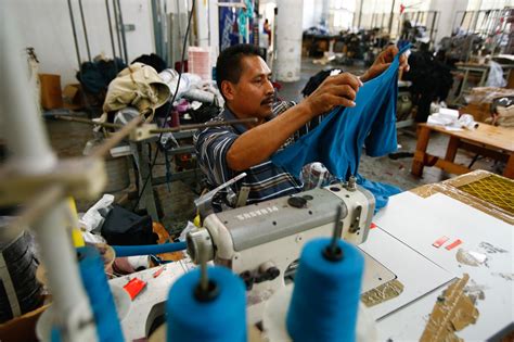 Behind a $13 shirt, a $6-an-hour worker | Factory worker, Sewing ...