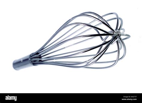 Wire whisk silhouetted on a white background Stock Photo - Alamy